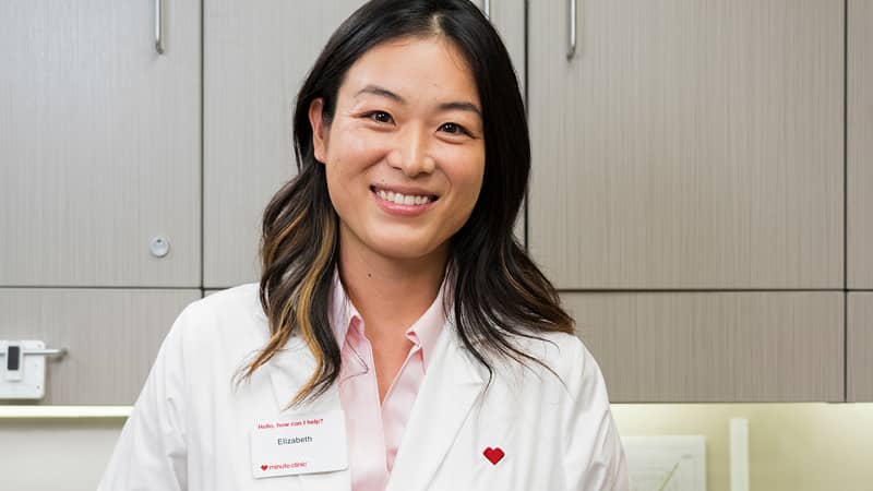 A CVS practitioner smiling.