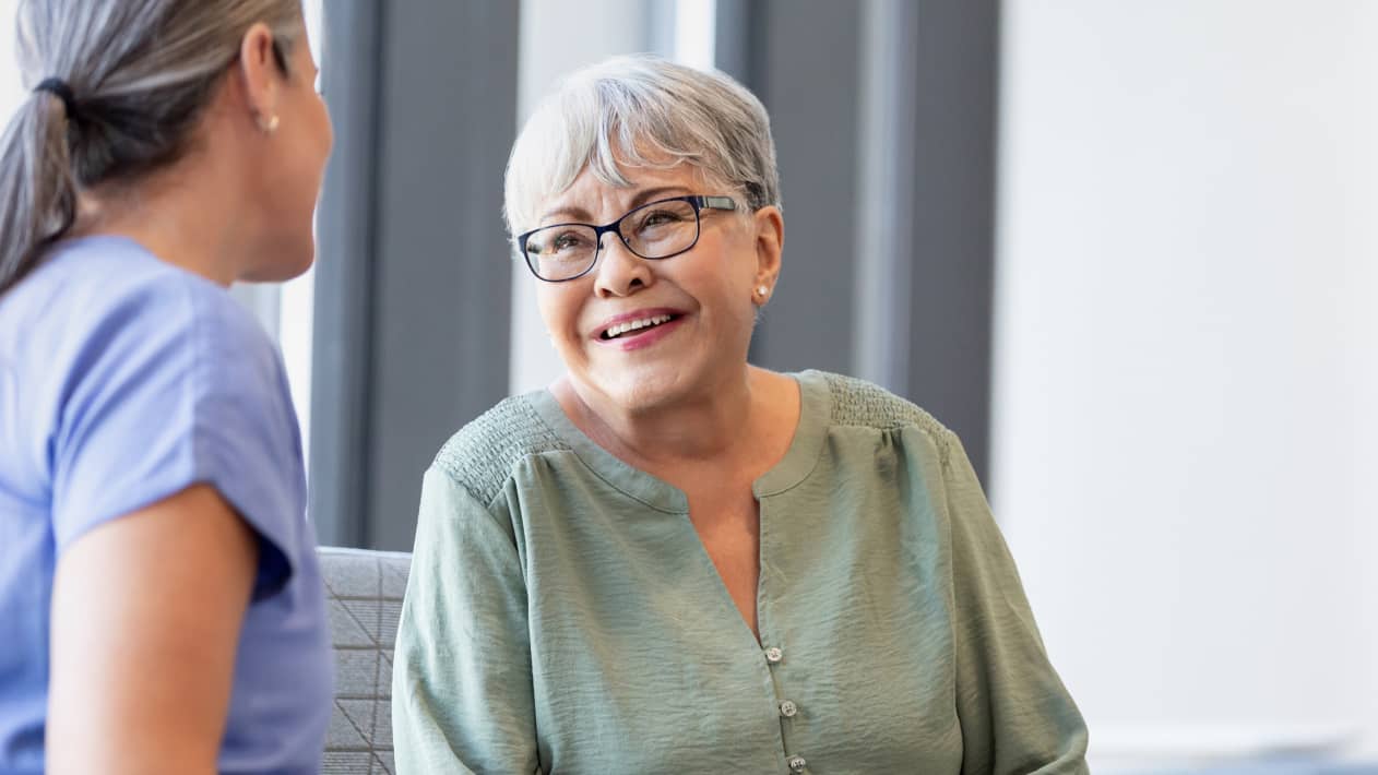A CareTeam member in conversation with a patient.